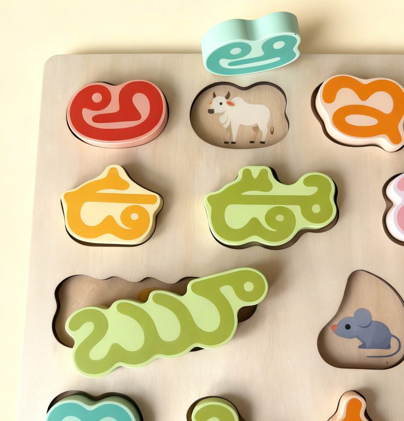 Child engaged in bilingual learning through hands-on play